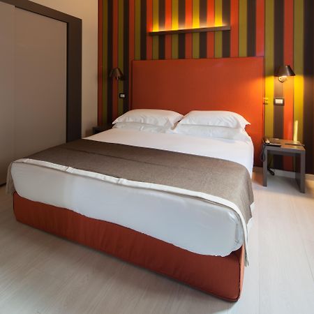 Fifty House Cellini Hotel Milan Exterior photo A room at the hotel
