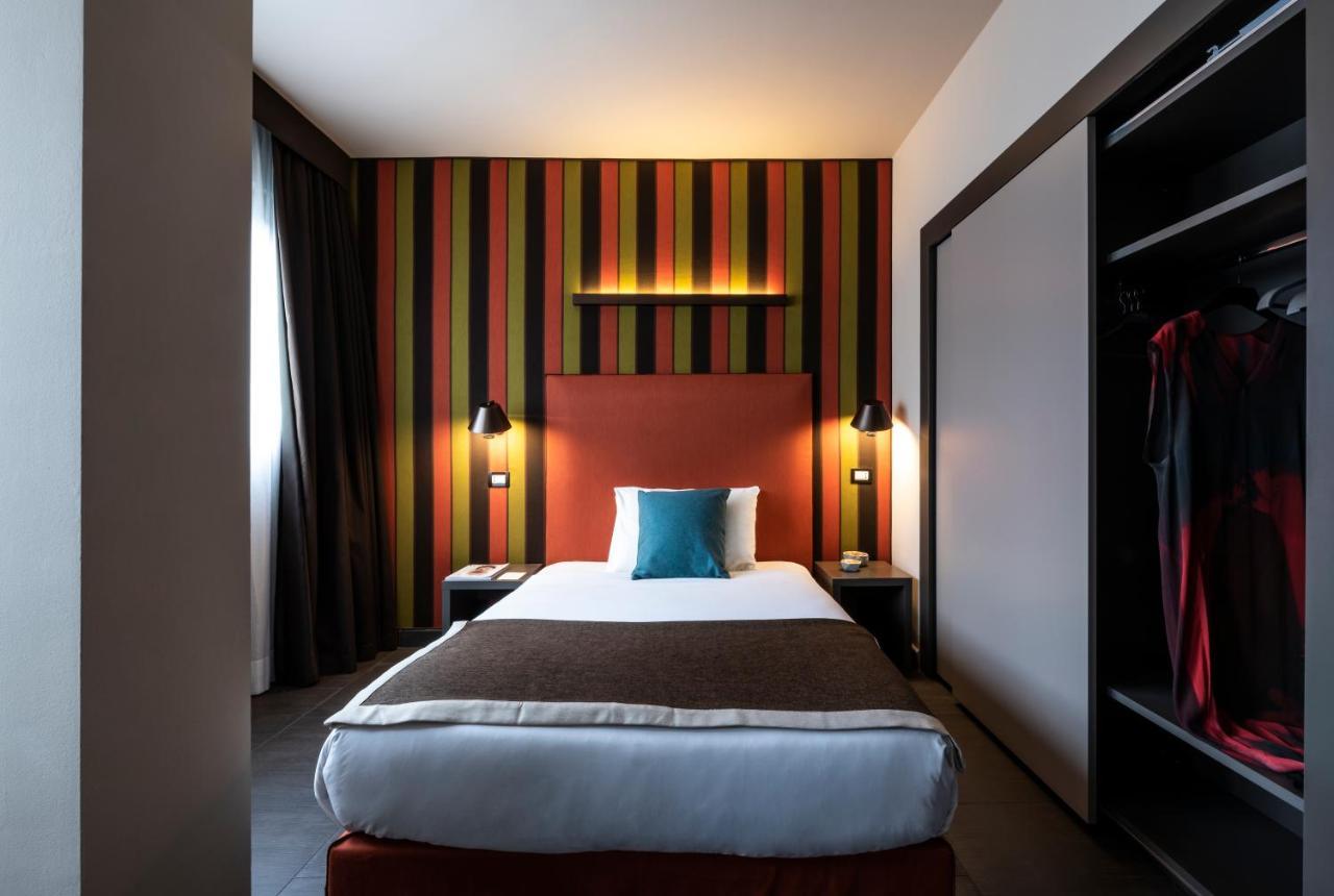 Fifty House Cellini Hotel Milan Exterior photo A room at the hotel