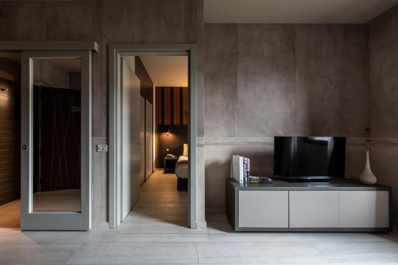 Fifty House Cellini Hotel Milan Exterior photo A room at the hotel