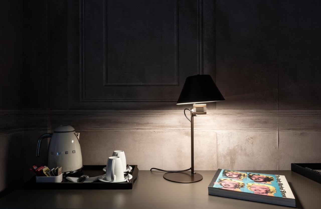 Fifty House Cellini Hotel Milan Exterior photo A table lamp