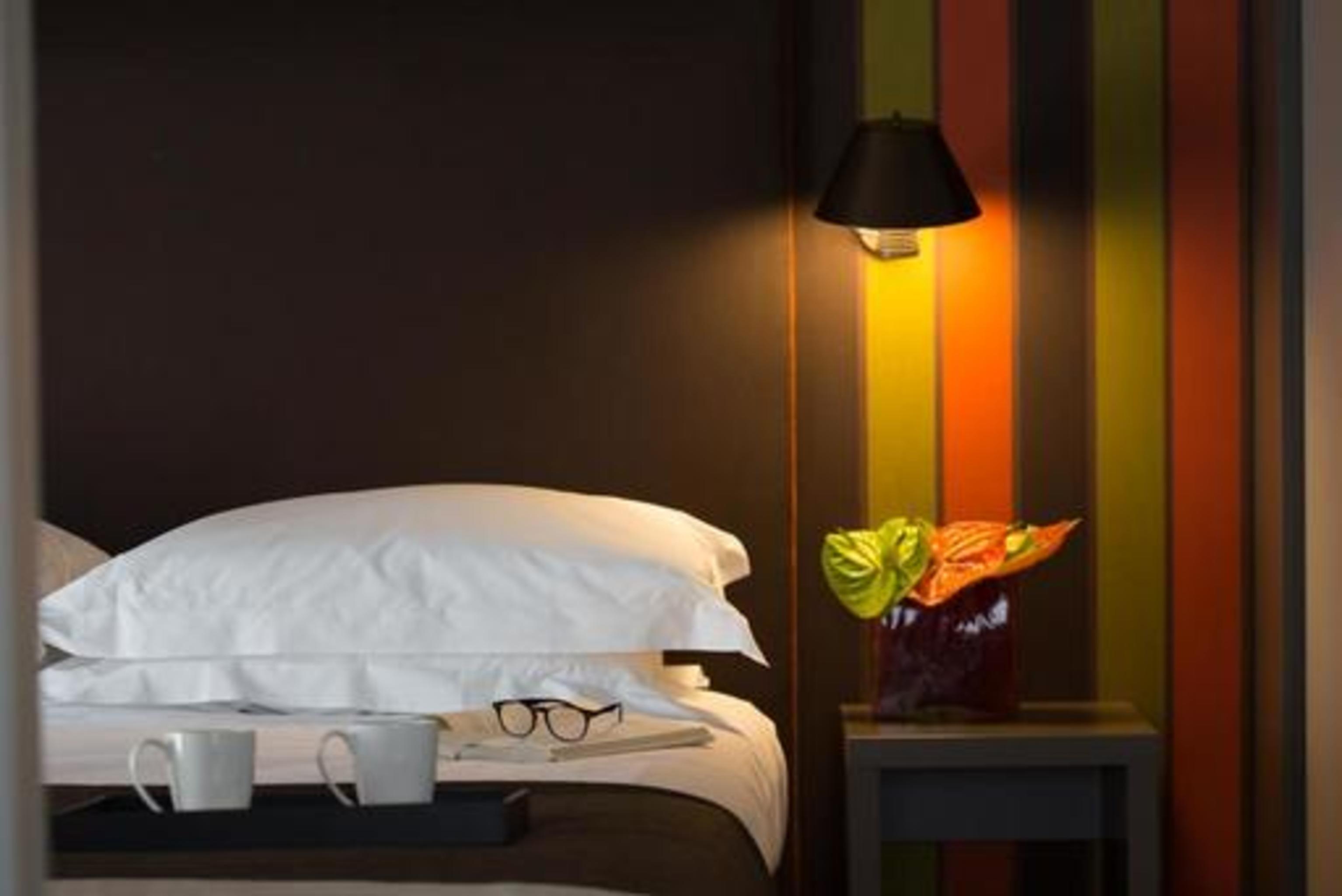 Fifty House Cellini Hotel Milan Exterior photo A room at the hotel