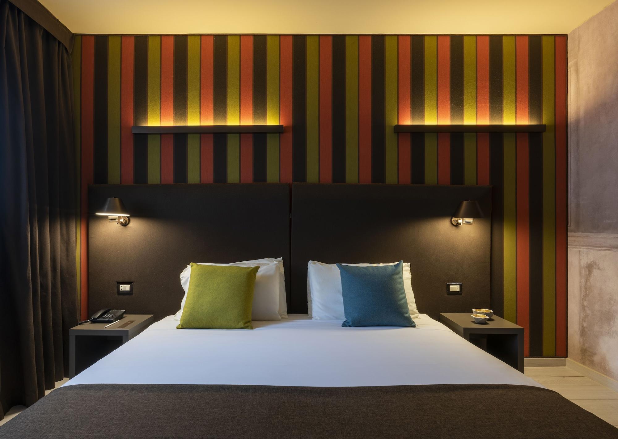 Fifty House Cellini Hotel Milan Exterior photo A room at the hotel