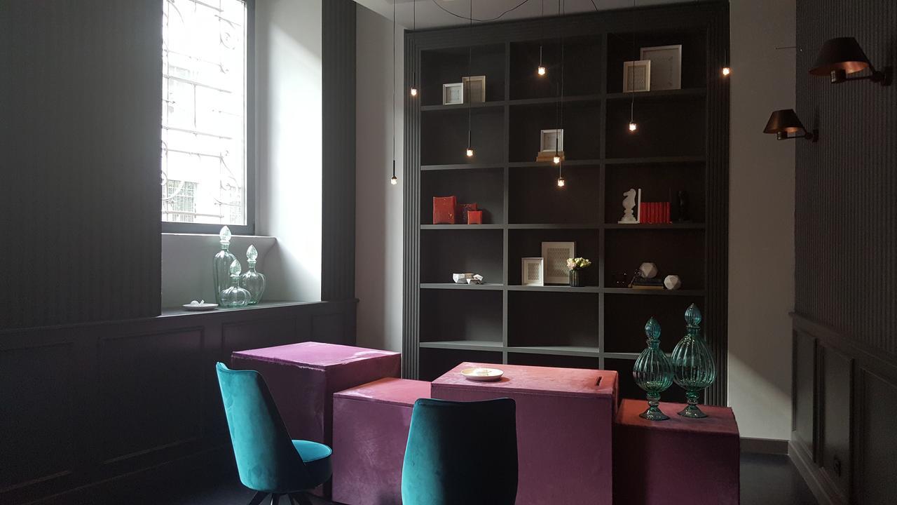 Fifty House Cellini Hotel Milan Exterior photo The interior of the library
