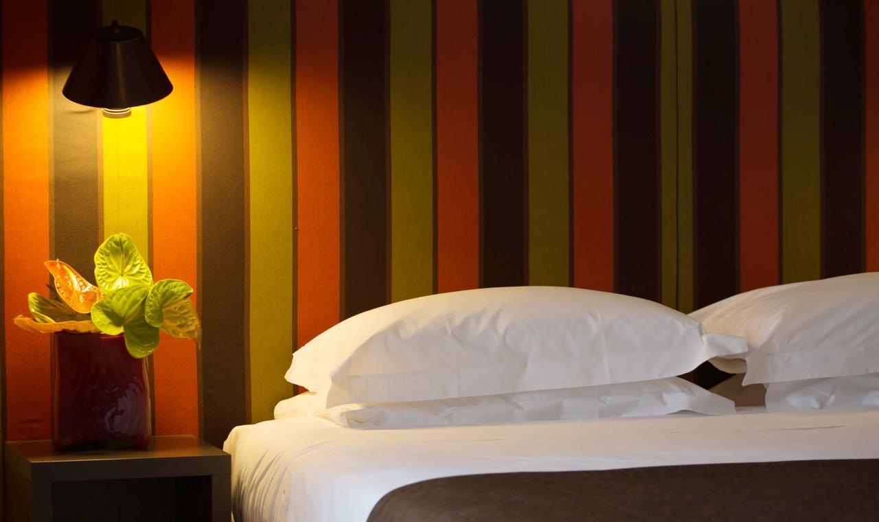 Fifty House Cellini Hotel Milan Exterior photo A room at the hotel