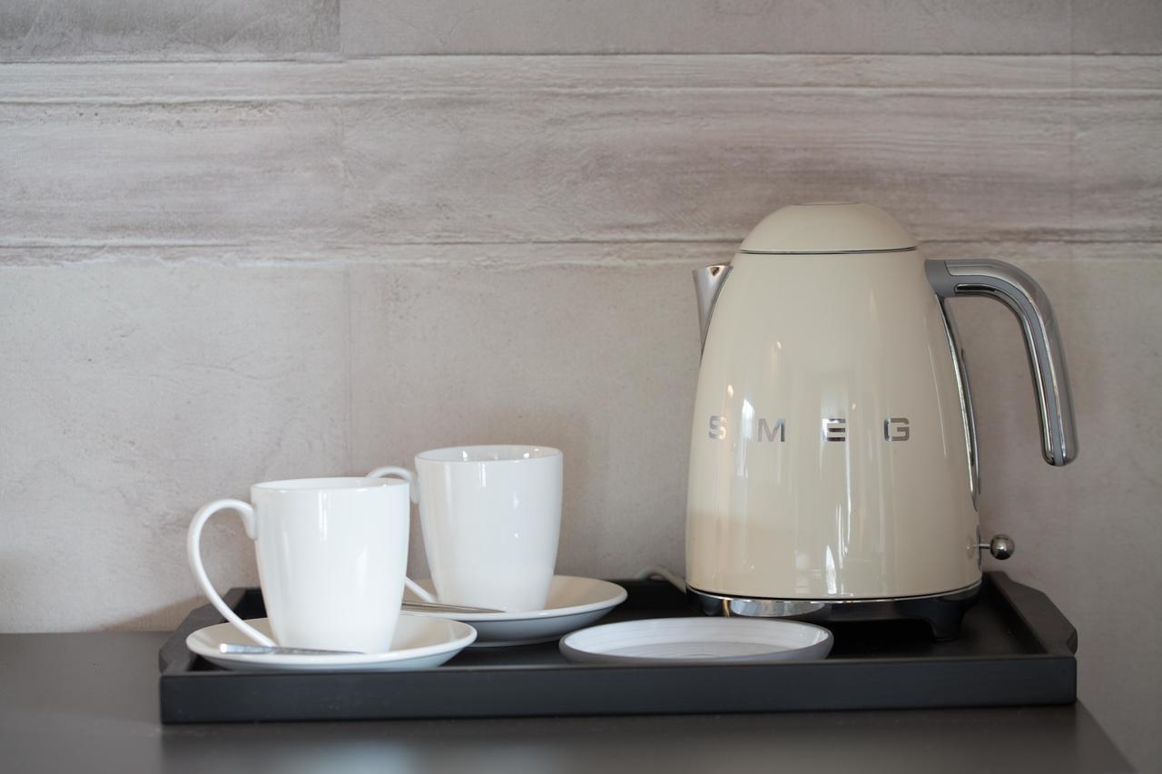 Fifty House Cellini Hotel Milan Exterior photo A kettle
